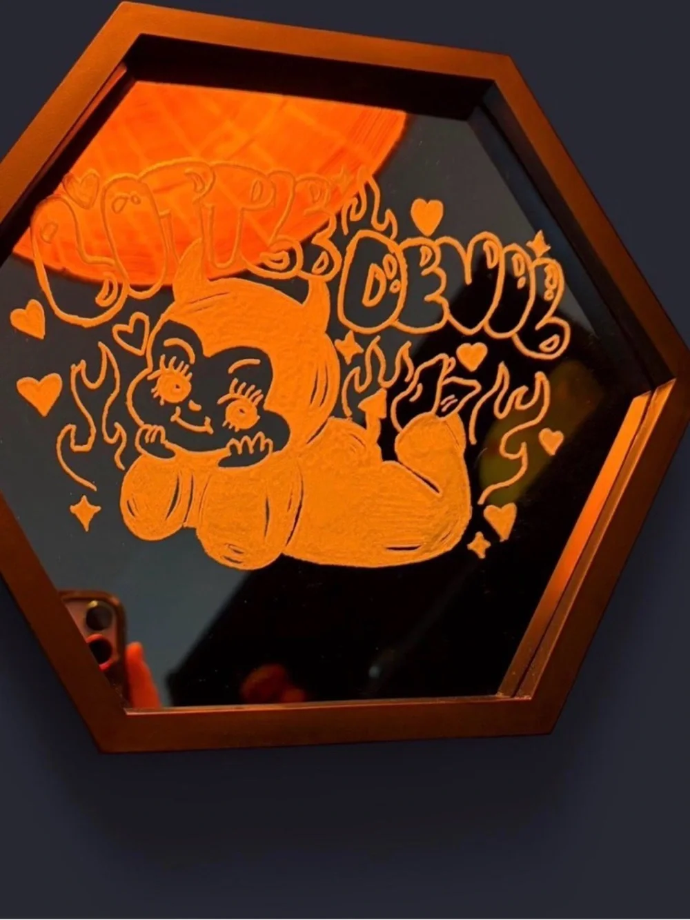 Black Hexagon Wall Mirror with Cute Devil Baby Illustration